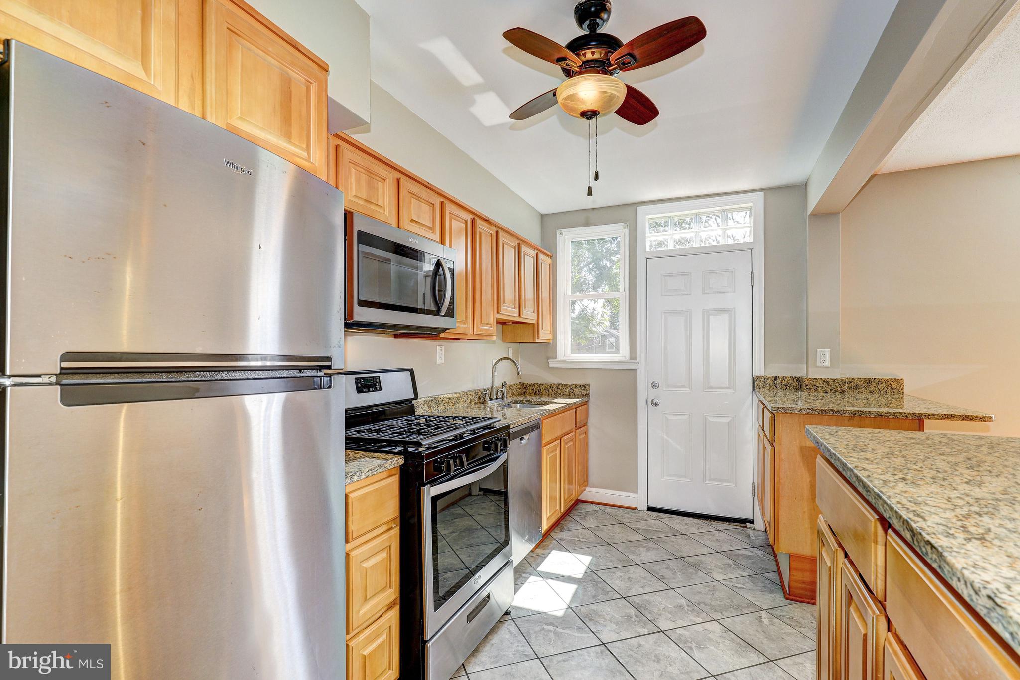 5203 Garmouth Road Baltimore, MD 21229 - Photo 12 of 42 Kitchen | Sleek Stainless Steel Appliances