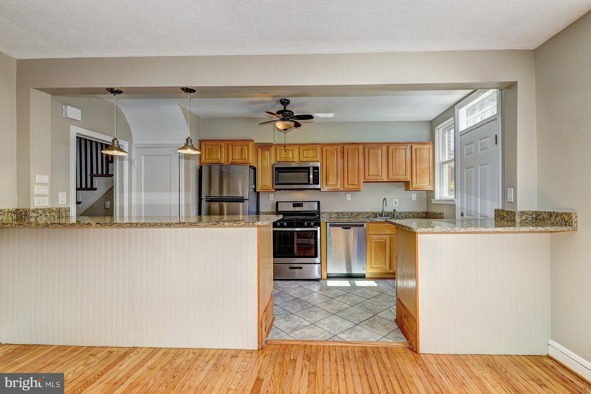 5203 Garmouth Road Baltimore, MD 21229 - Photo 17 of 42 Granite Countertops | Breakfast Bar