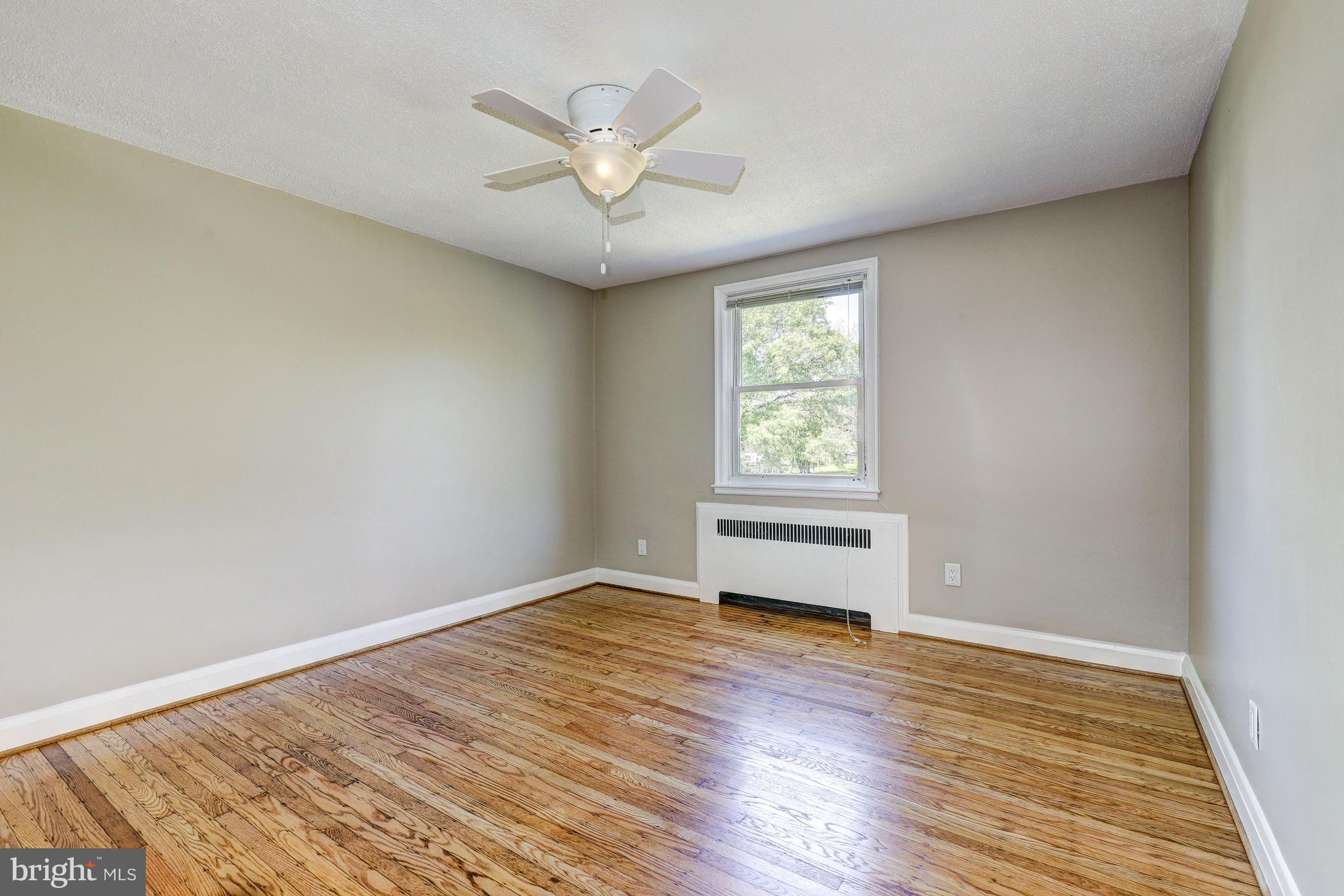 5203 Garmouth Road Baltimore, MD 21229 - Photo 19 of 42 Primary Bedroom | Hardwood Floors