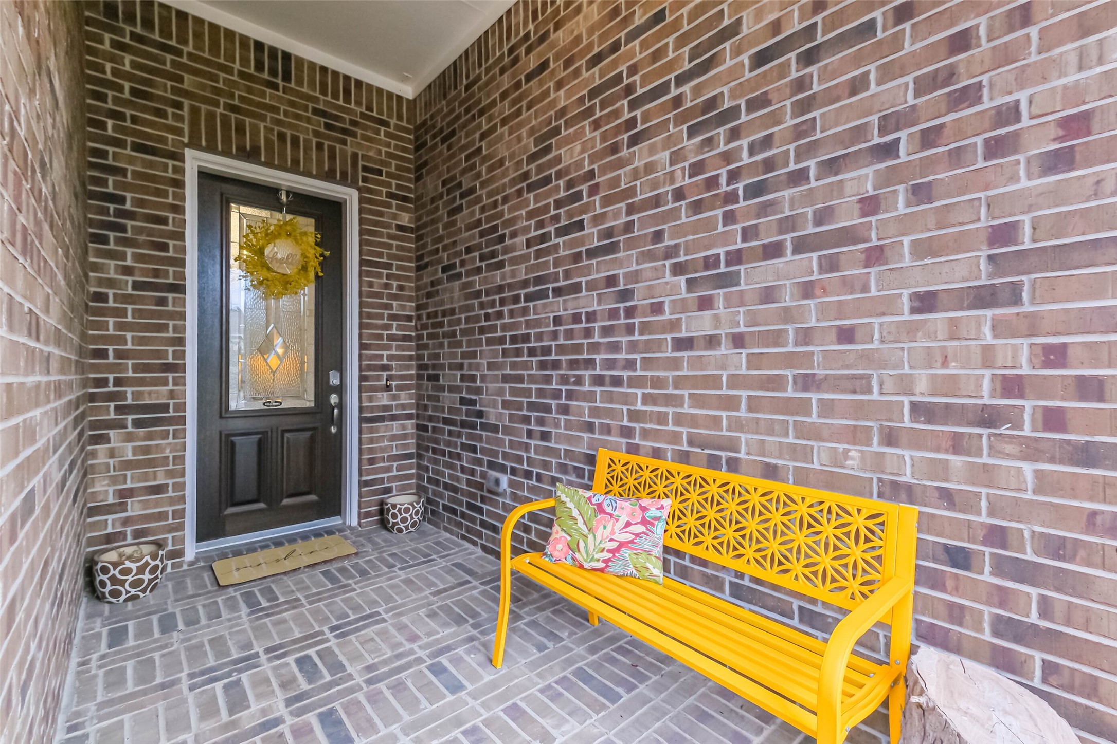 6214 Scott Way Rosenberg, TX 77471 - Photo 2 of 19 a blue bench sitting in front of a building