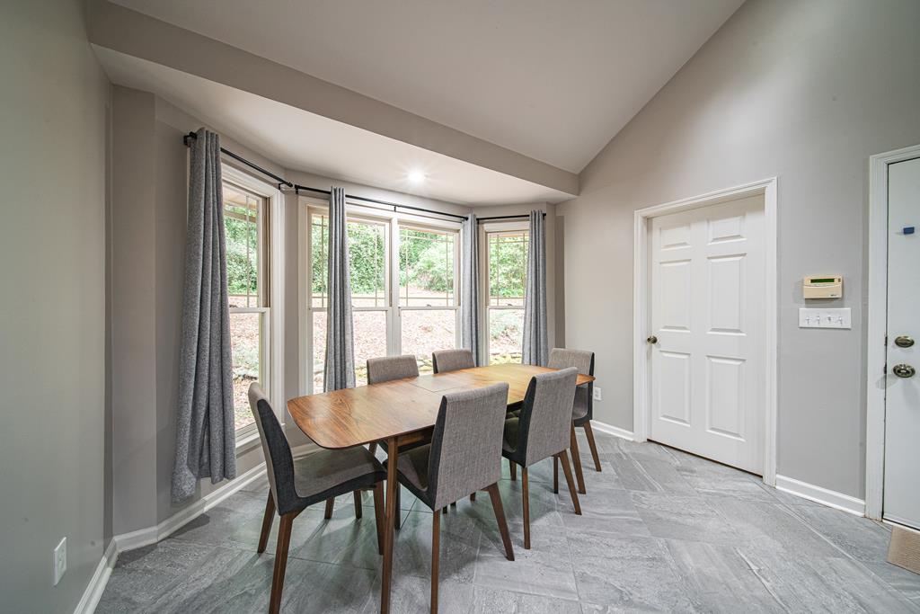 111 Stoneridge Road Cataula, GA 31804 - Photo 21 of 45 a view of a dining room with furniture and window