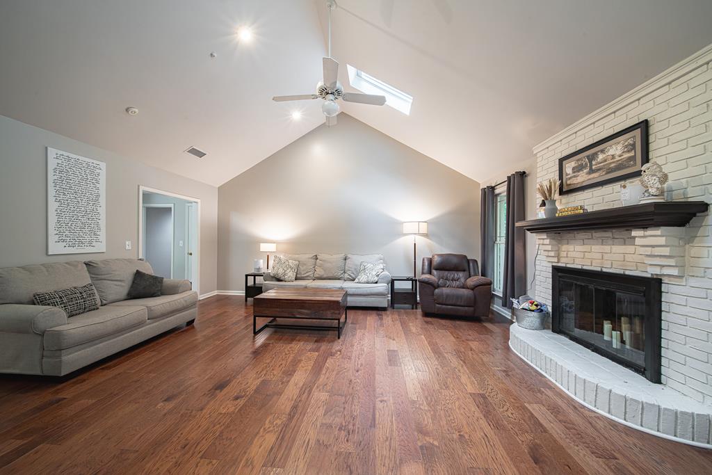 111 Stoneridge Road Cataula, GA 31804 - Photo 22 of 45 a living room with furniture and a fireplace