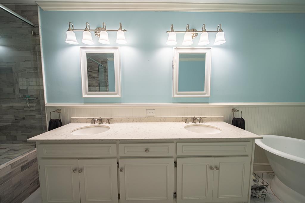 111 Stoneridge Road Cataula, GA 31804 - Photo 28 of 45 a bathroom with a sink and a mirror