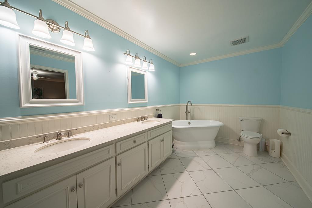111 Stoneridge Road Cataula, GA 31804 - Photo 29 of 45 a bathroom with a double vanity sink mirror and toilet