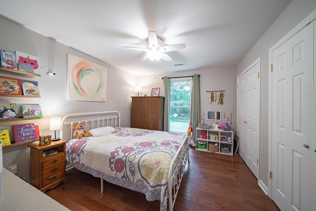 111 Stoneridge Road Cataula, GA 31804 - Photo 34 of 45 a bedroom with a bed and dresser