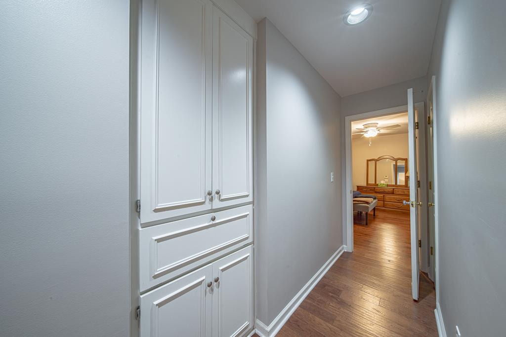 111 Stoneridge Road Cataula, GA 31804 - Photo 36 of 45 a view of a hallway view with wooden floor and staircase