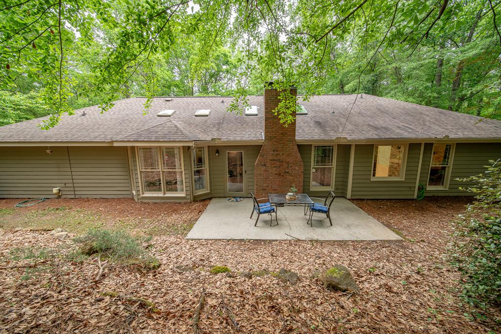 111 Stoneridge Road Cataula, GA 31804 - Photo 40 of 45 a front view of a house with garden and patio