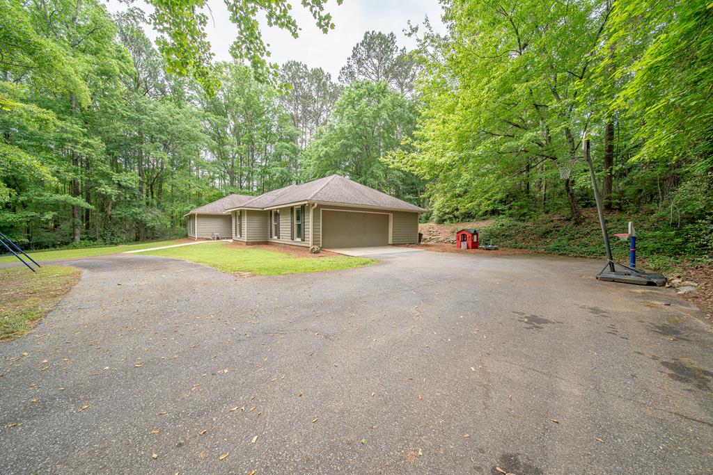 111 Stoneridge Road Cataula, GA 31804 - Photo 4 of 45 a view of house with outdoor space and swimming pool