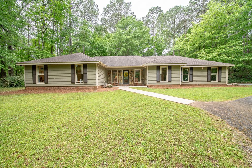 111 Stoneridge Road Cataula, GA 31804 - Photo 7 of 45 a front view of a house with a garden