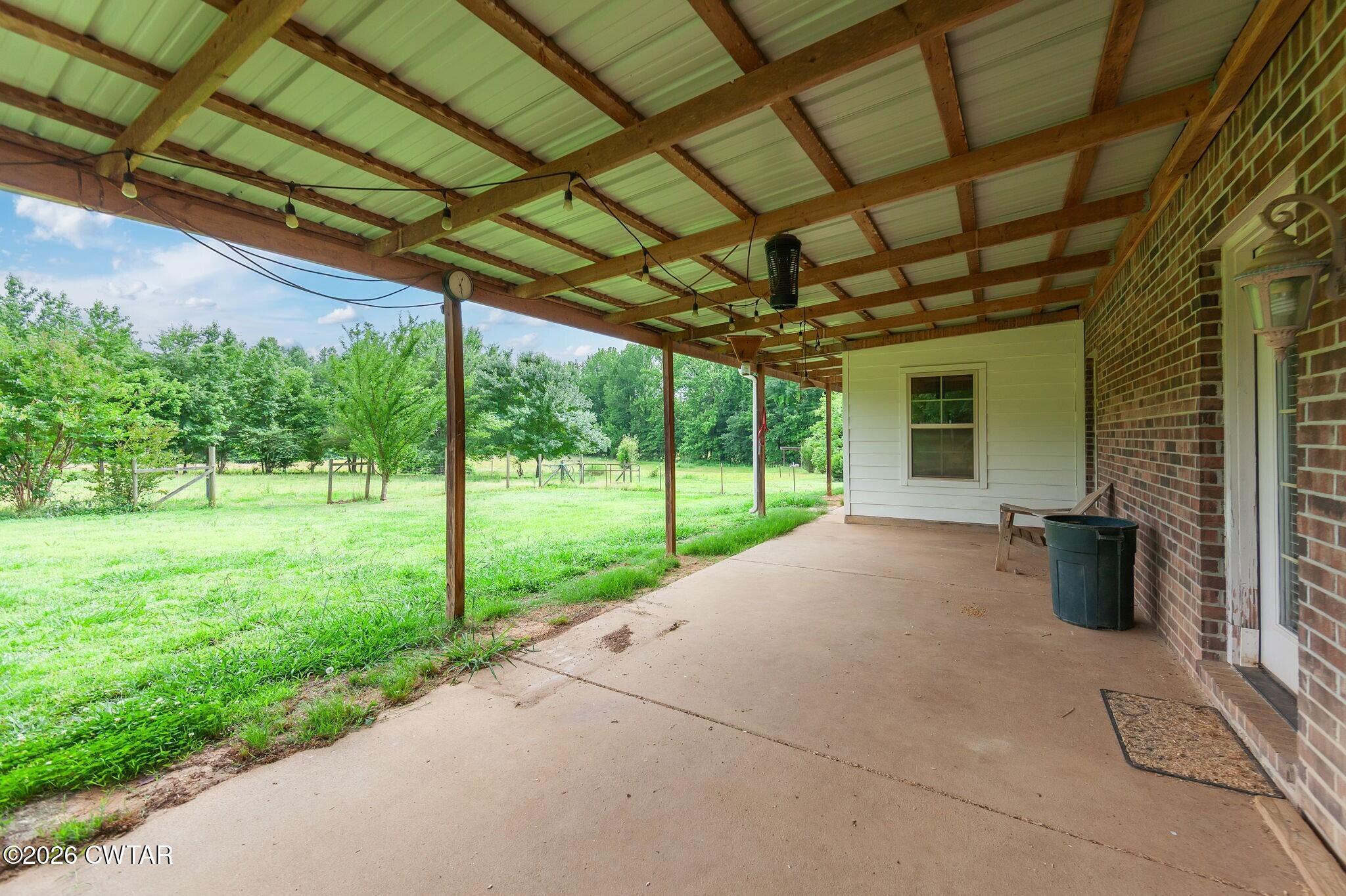 4080 Beech Bluff Road Beech Bluff, TN 38313 - Photo 40 of 41 a view of a house with backyard and porch