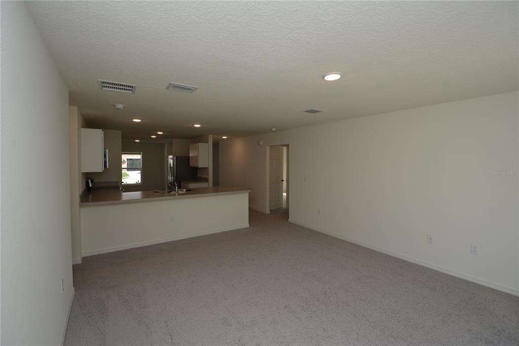 8 Sea Flower Path Palm Coast, FL 32164 - Photo 13 of 30 a view of an empty room