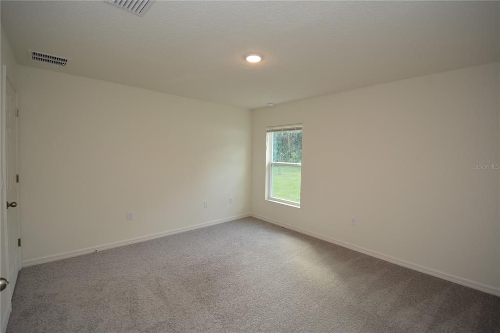 8 Sea Flower Path Palm Coast, FL 32164 - Photo 17 of 30 a view of room and window