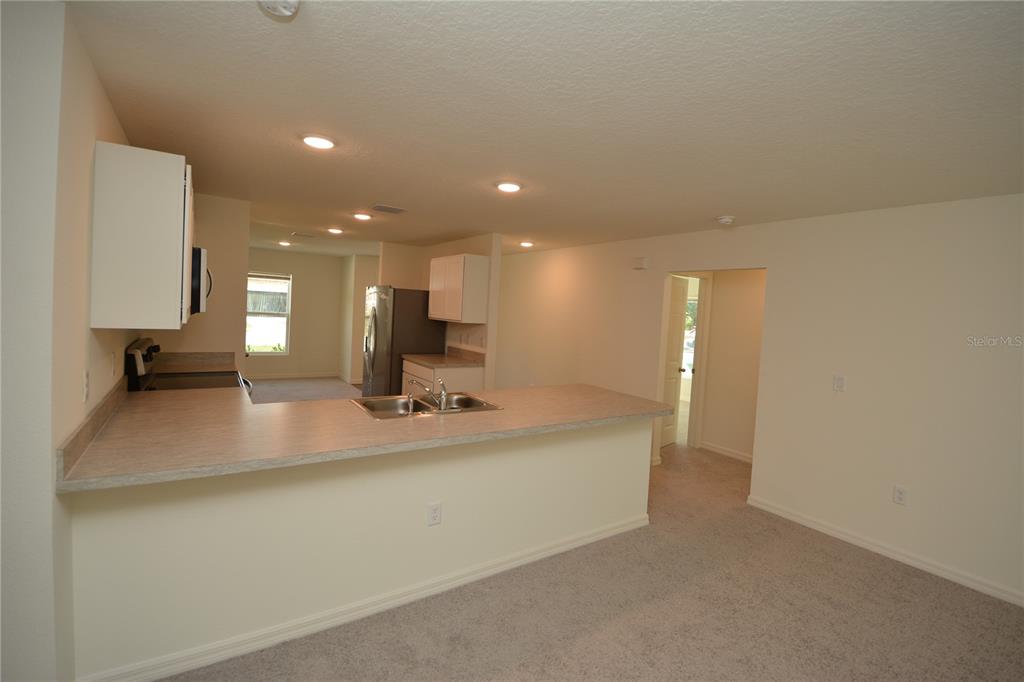 8 Sea Flower Path Palm Coast, FL 32164 - Photo 22 of 30 a view of a kitchen with a sink
