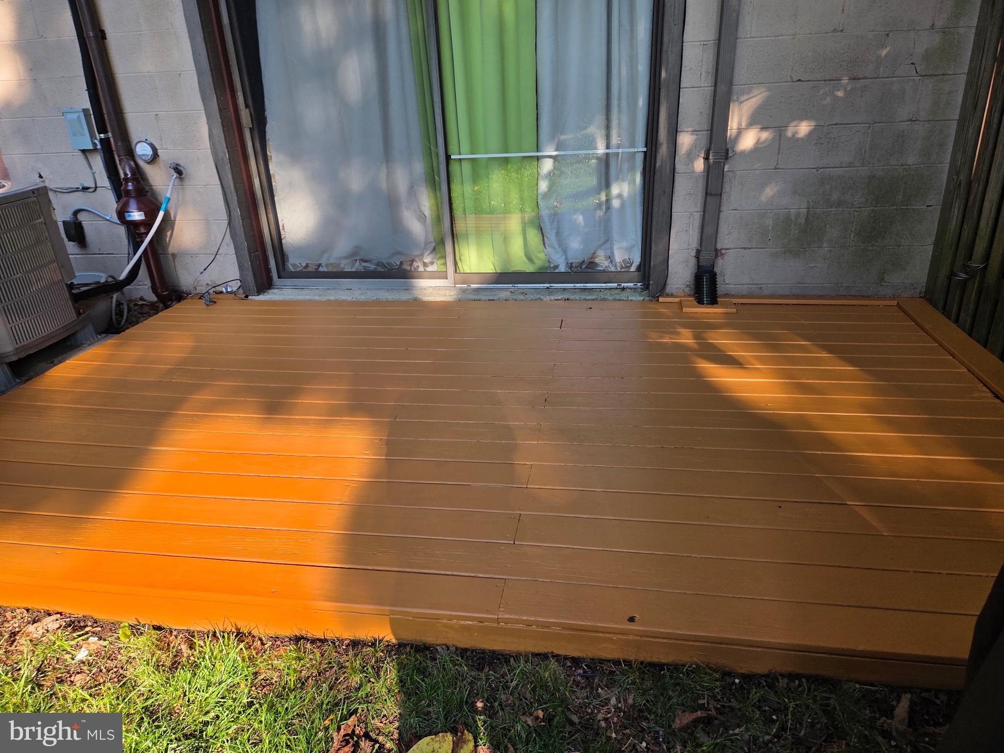 8938 Footed Ridge Columbia, MD 21045 - Photo 33 of 35 Newly stained deck