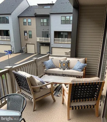 a bedroom with a bed and a night stand