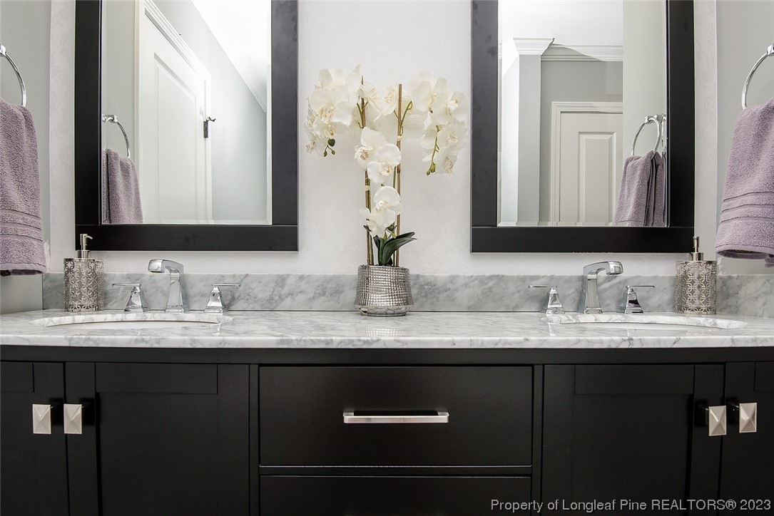 341 Solomon Drive Cameron, NC 28326 - Photo 12 of 21 a bathroom with a sink and a mirror