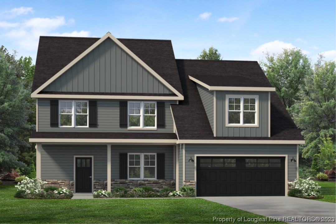 341 Solomon Drive Cameron, NC 28326 - Photo 19 of 21 a front view of a house with garden