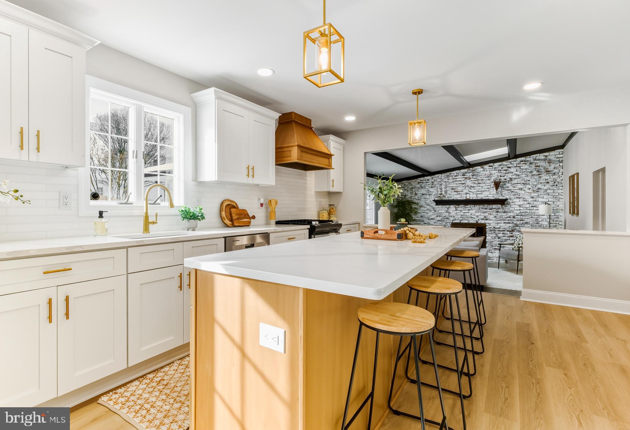 33 Elmgate Road Marlton, NJ 08053 - Photo 11 of 29 a kitchen with a sink a stove and chairs