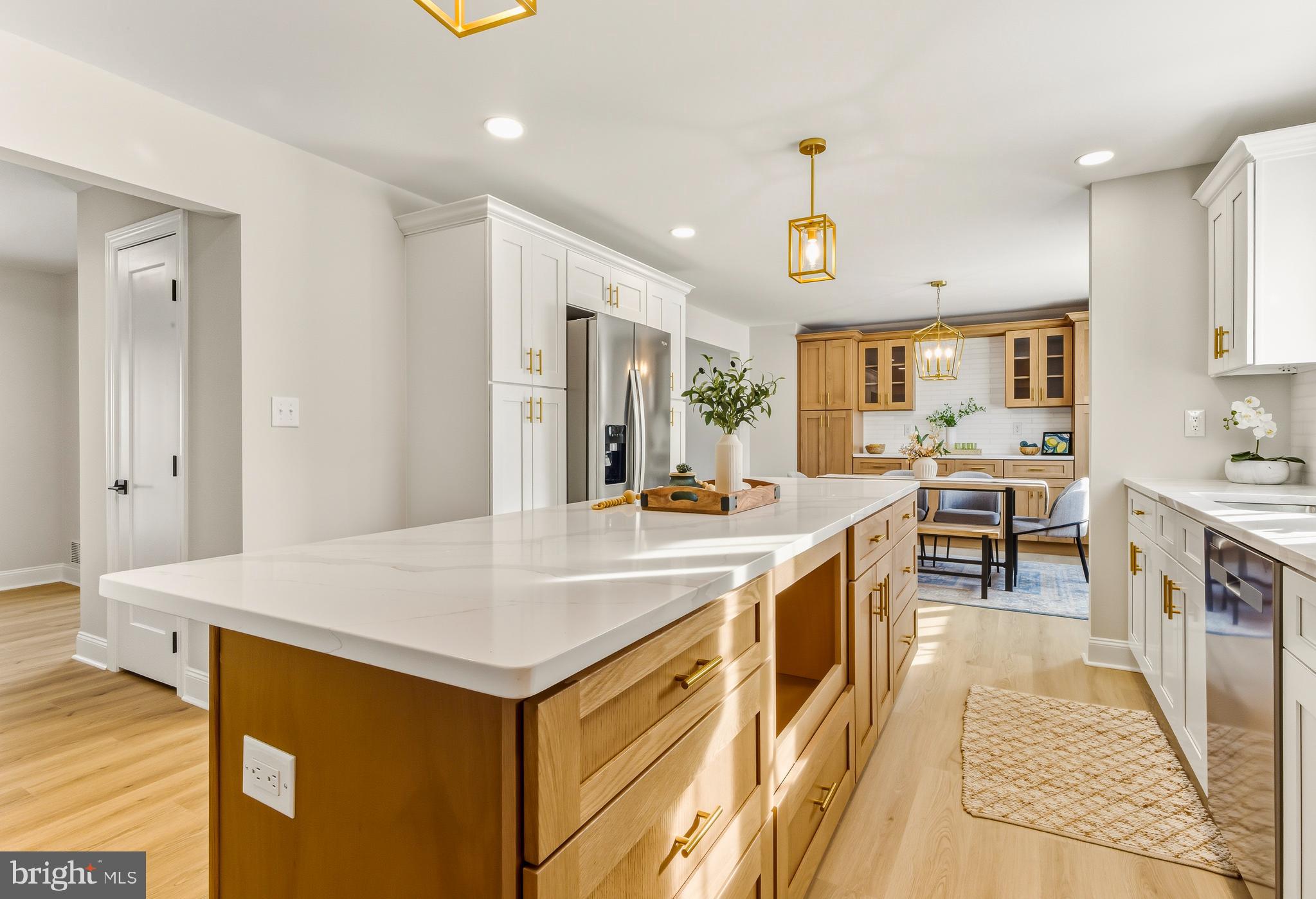 33 Elmgate Road Marlton, NJ 08053 - Photo 12 of 29 a large kitchen with kitchen island a sink a counter top space and stainless steel appliances