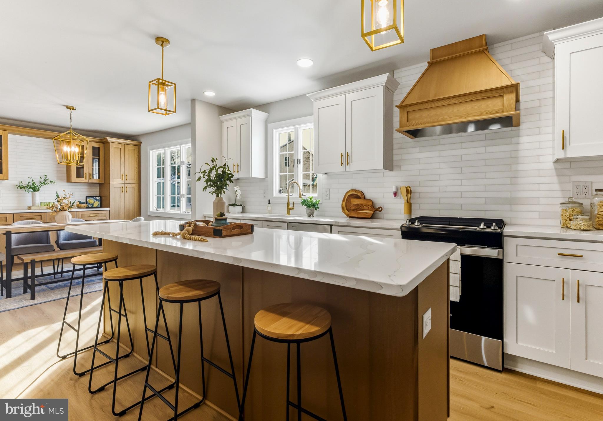 33 Elmgate Road Marlton, NJ 08053 - Photo 13 of 29 a kitchen with a sink a counter and chairs