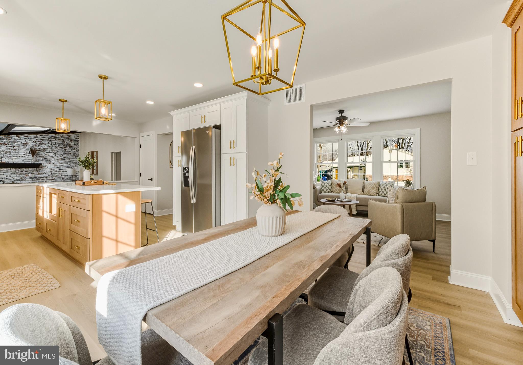 33 Elmgate Road Marlton, NJ 08053 - Photo 15 of 29 a living room with kitchen island furniture and a chandelier