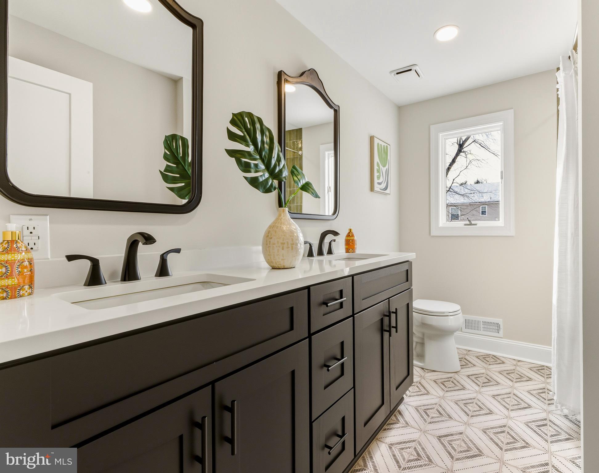 33 Elmgate Road Marlton, NJ 08053 - Photo 21 of 29 a bathroom with a double vanity sink and a mirror
