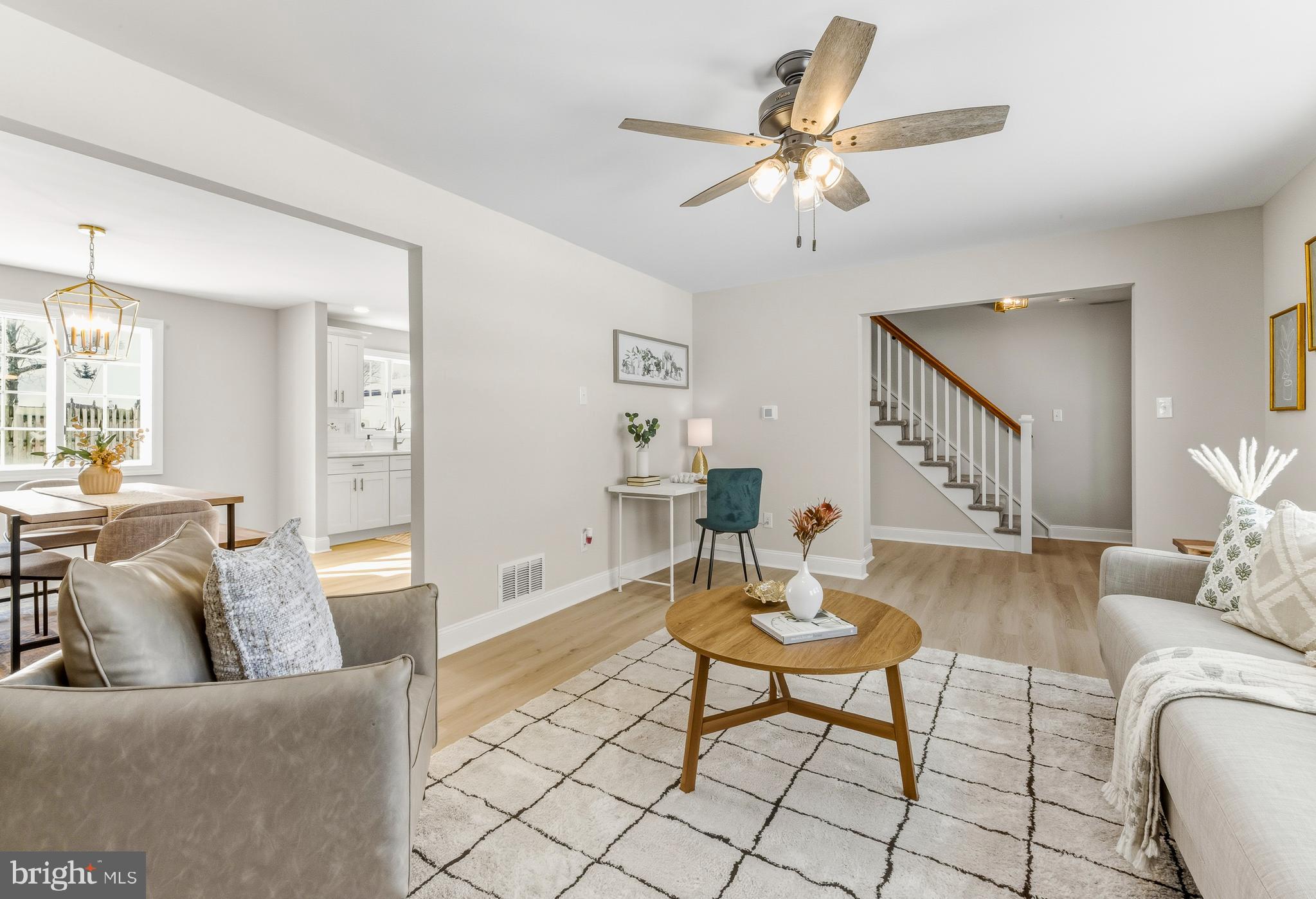 33 Elmgate Road Marlton, NJ 08053 - Photo 6 of 29 a living room with furniture and a chandelier