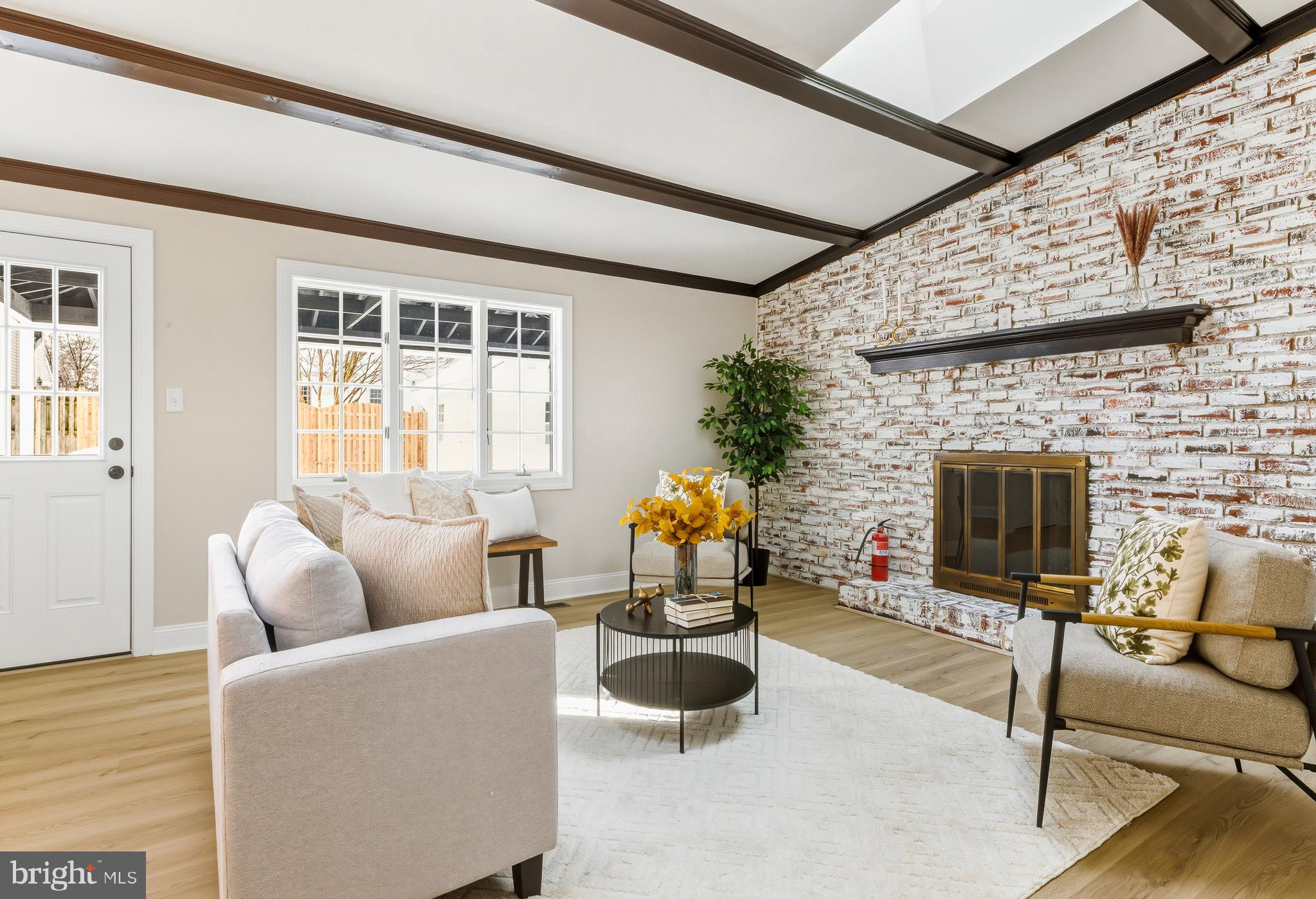 33 Elmgate Road Marlton, NJ 08053 - Photo 10 of 29 a living room with furniture a flat screen tv and a fireplace