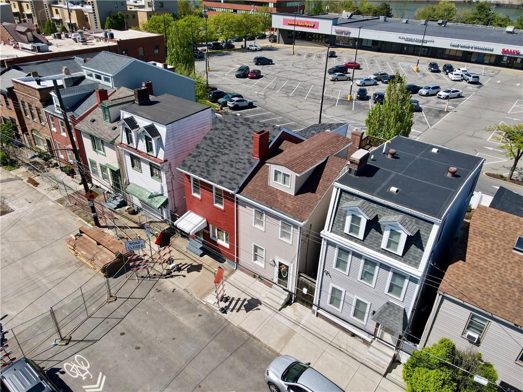 1923 Wharton Street Pittsburgh, PA 15203 - Photo 1 of 34 an aerial view of multiple houses with yard