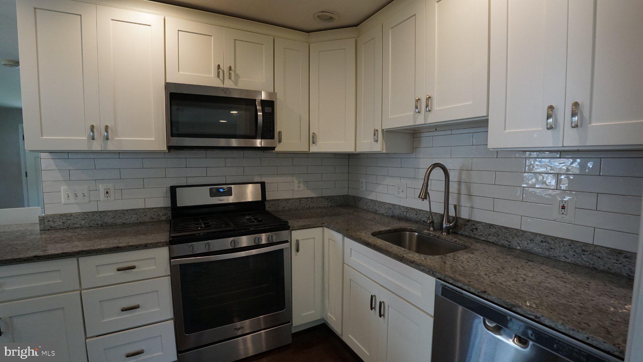 2006 Griffith Road Falls Church, VA 22043 - Photo 6 of 16 Modern kitchen with sleek finishes.
