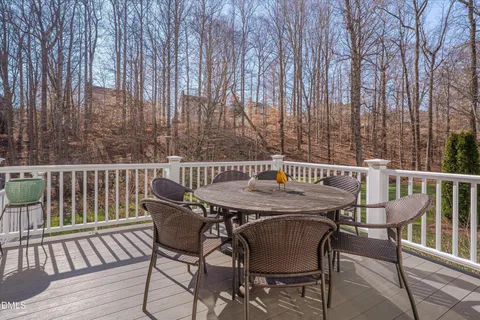 a outdoor living space with patio furniture and a fireplace