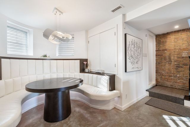 a bathroom with a sink a toilet and bathtub