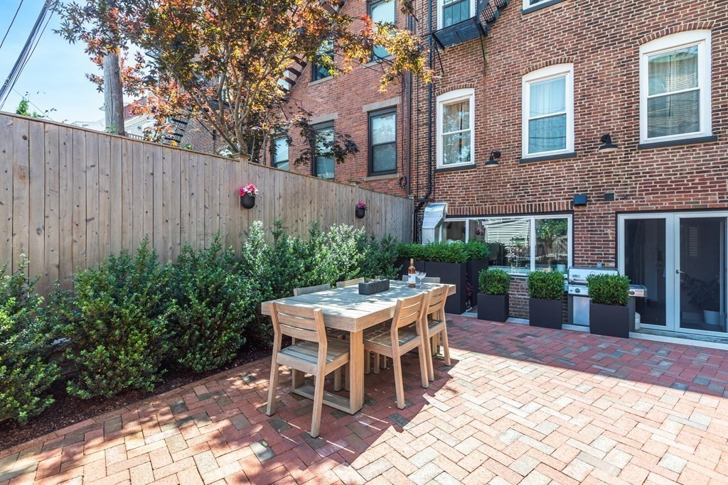 112 West 3rd Street Boston, MA 02127 - Photo 26 of 33 a view of a house with backyard and sitting area