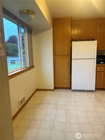 a view of a storage & utility room with washer and dryer