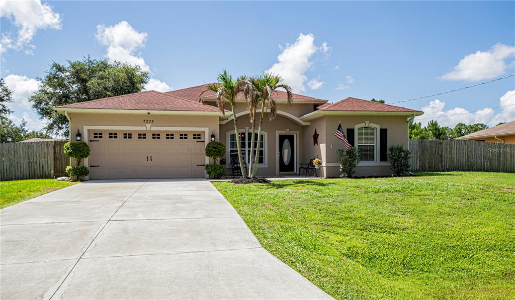 7375 South Paragon Road North Port, FL 34291 - Photo 1 of 1 Talk about CURB APPEAL! Situated on an oversized .25 acre lot