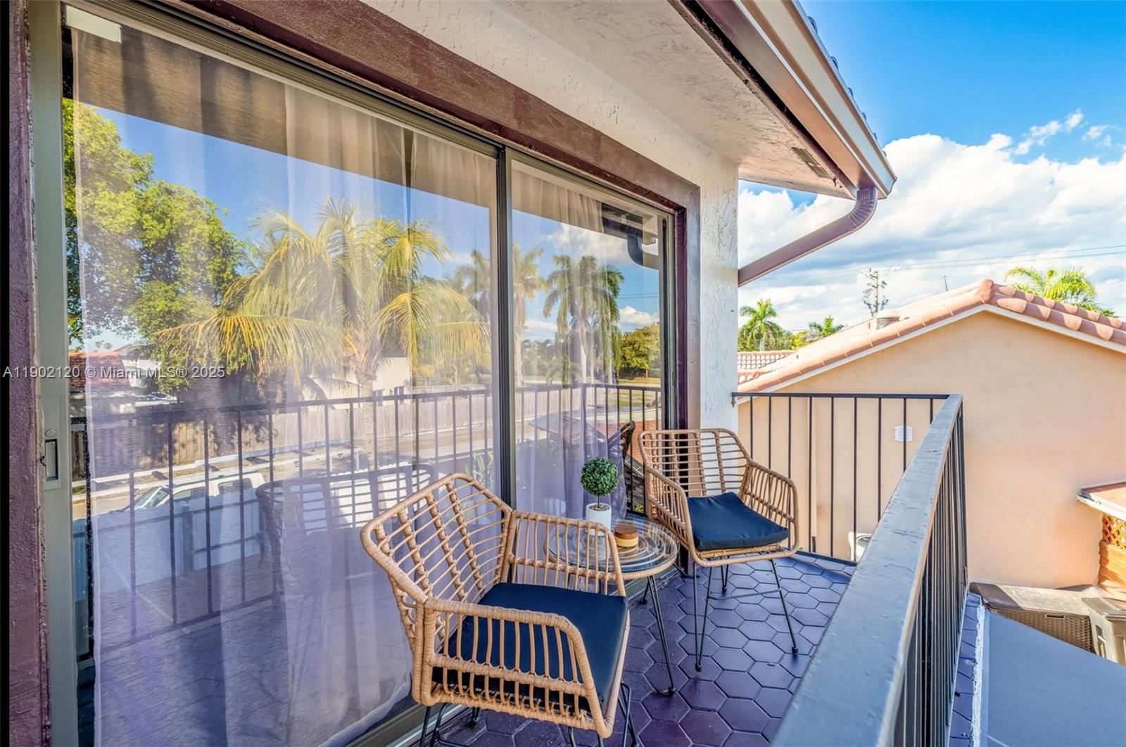 15445 Southwest 57th Street Miami, FL 33193 - Photo 12 of 32 a view of balcony with wooden floor