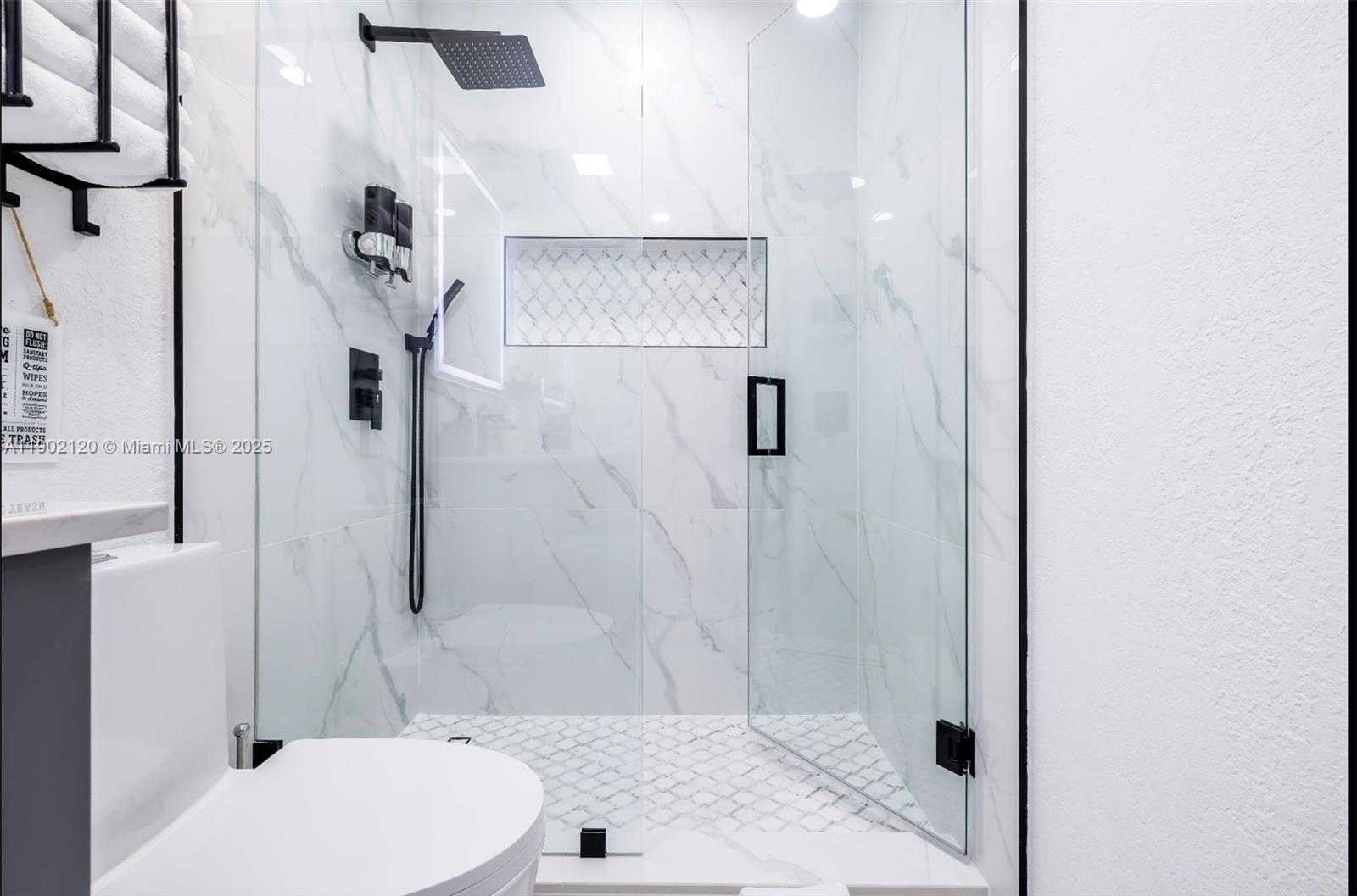 15445 Southwest 57th Street Miami, FL 33193 - Photo 22 of 32 a bathroom with a toilet and a shower