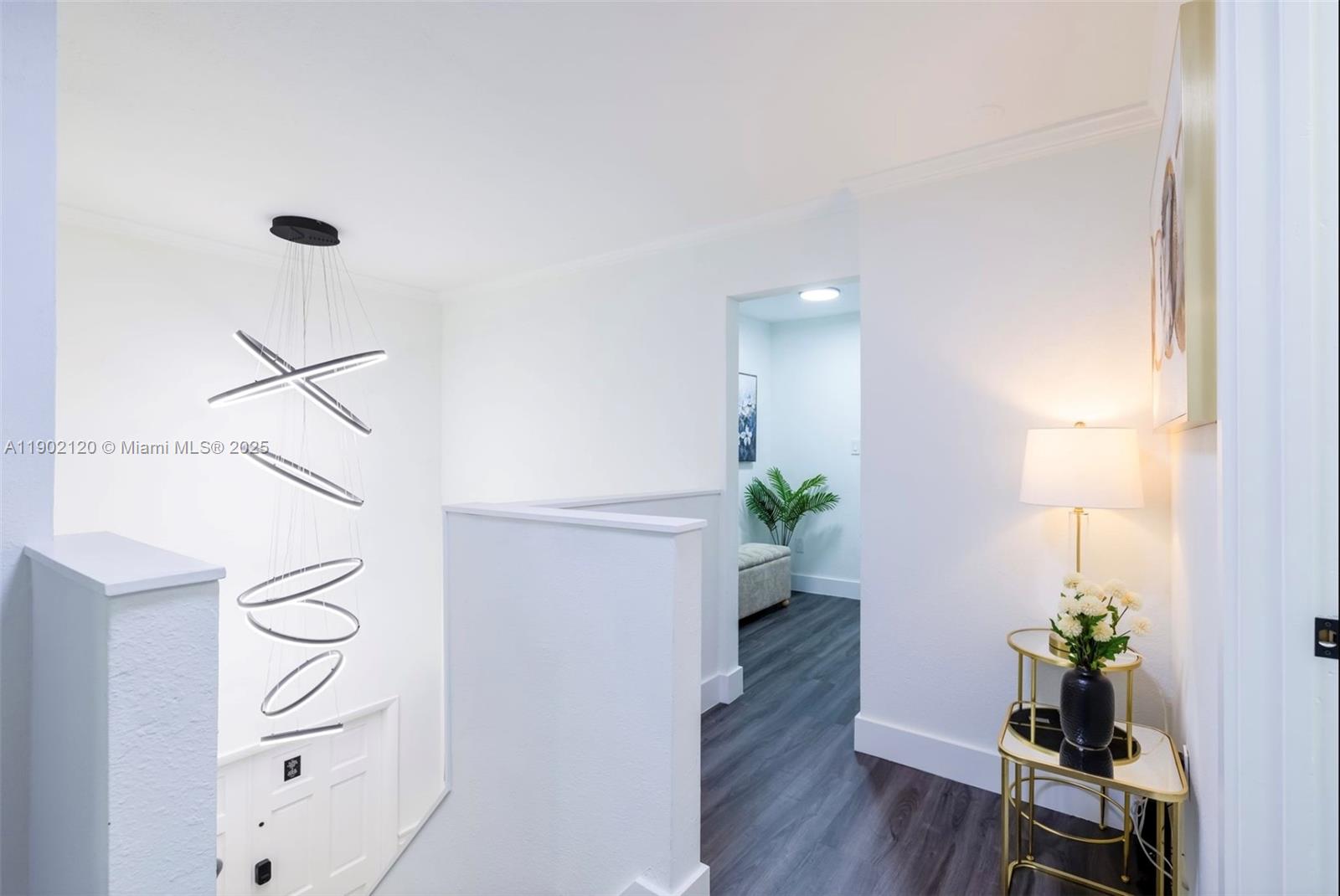 15445 Southwest 57th Street Miami, FL 33193 - Photo 9 of 32 a view of an entryway with wooden floor