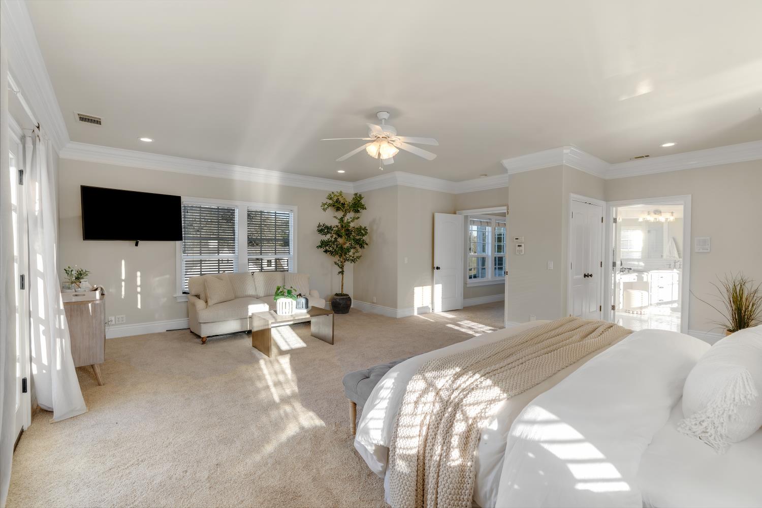 2905 Virginiatown Road Lincoln, CA 95648 - Photo 23 of 86 Spacious bedroom featuring light-colored carpeting, multiple windows with blinds, crown molding, and a ceiling fan