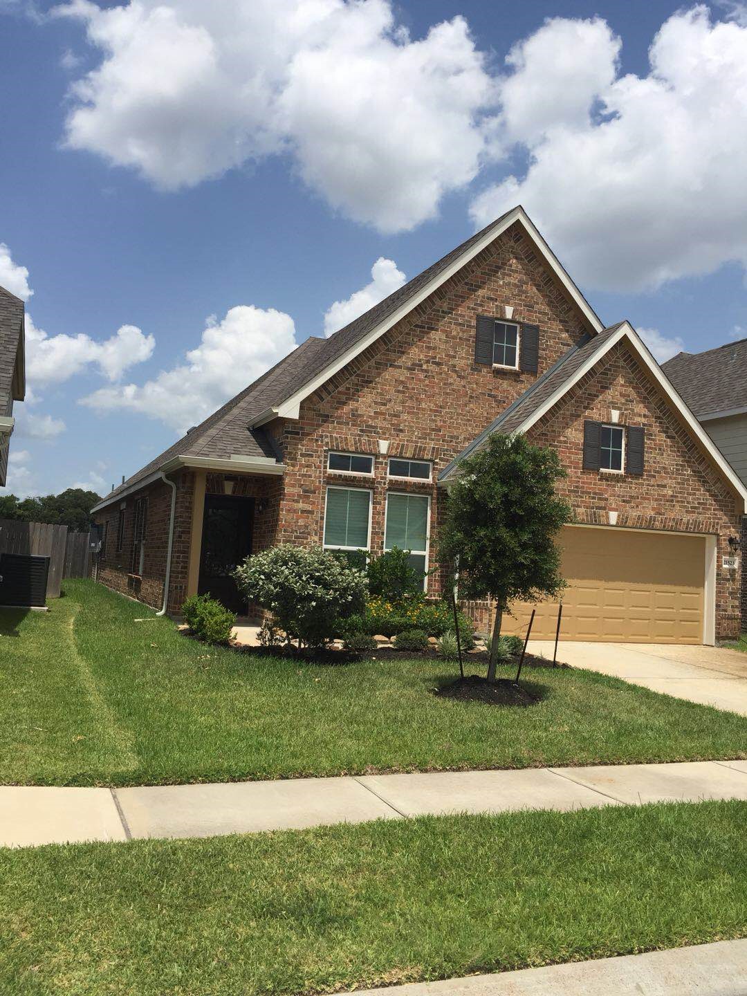 21523 Rainfall Park Drive Spring, TX 77389 - Photo 2 of 22 a front view of a house with a yard
