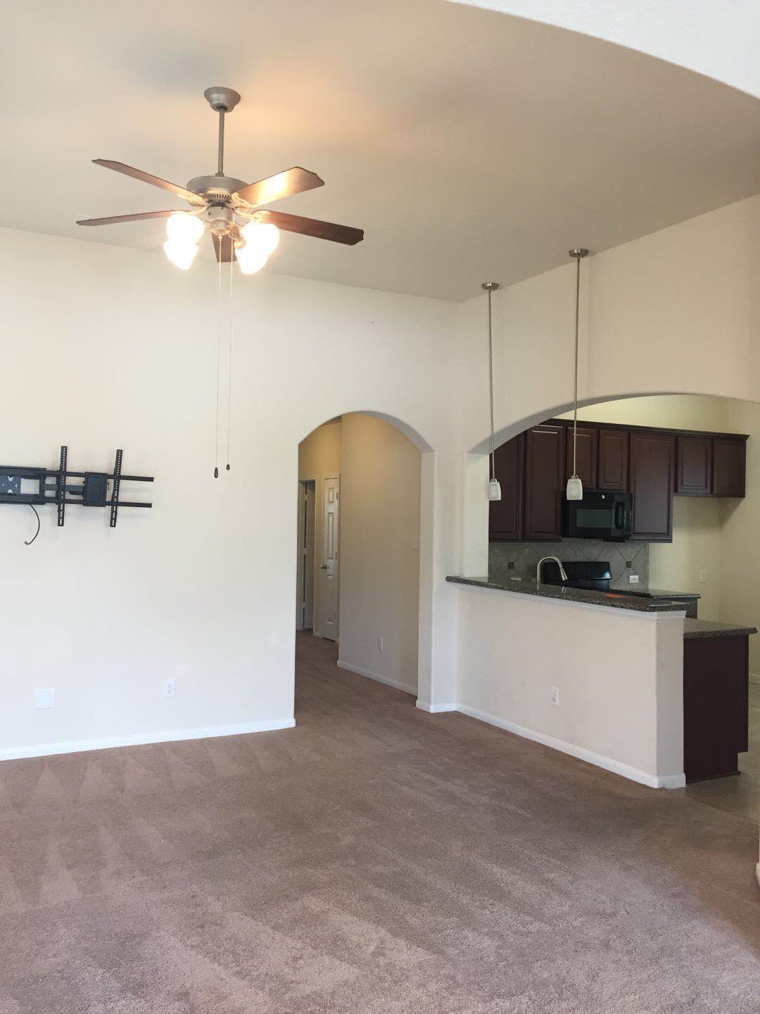 21523 Rainfall Park Drive Spring, TX 77389 - Photo 4 of 22 a kitchen with stainless steel appliances granite countertop a refrigerator a sink a stove and dishwasher
