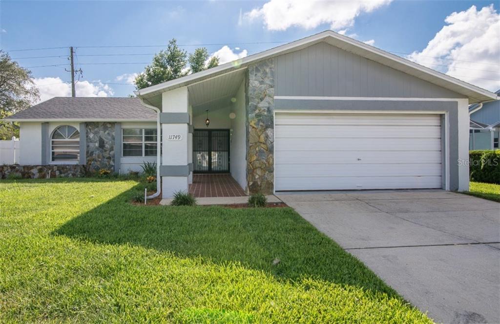 11749 Nature Trail Port Richey, FL 34668 - Photo 1 of 1 Exterior Front