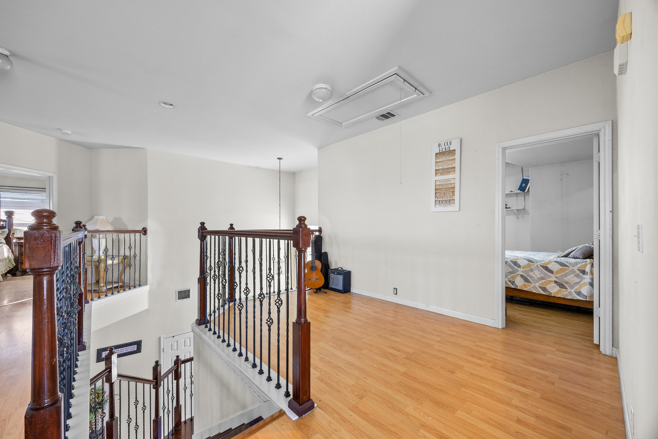 3502 Shiraz Loop Round Rock, TX 78665 - Photo 11 of 23 a view of a livingroom with wooden floor and a ceiling fan