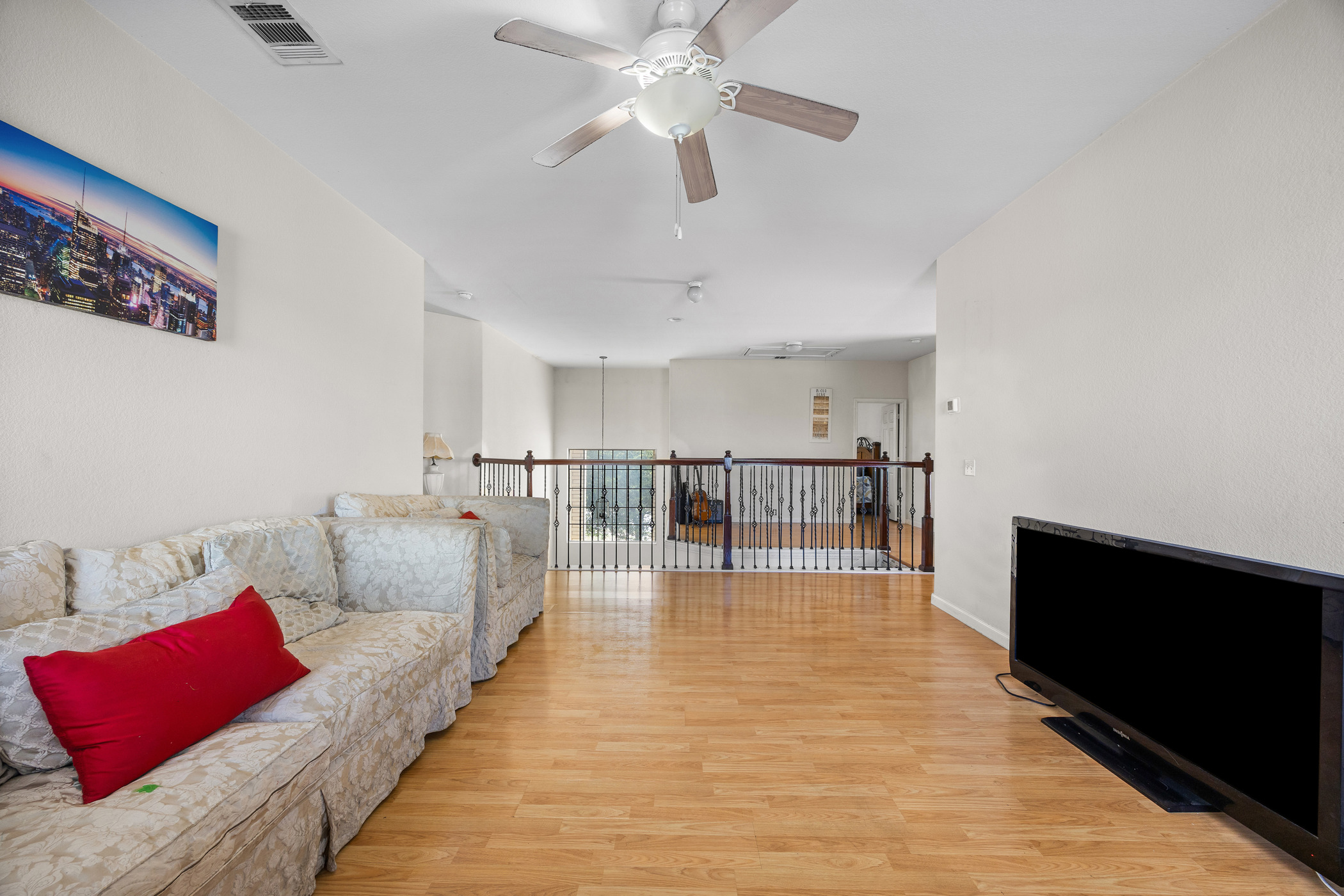 3502 Shiraz Loop Round Rock, TX 78665 - Photo 13 of 23 a living room with furniture and a flat screen tv