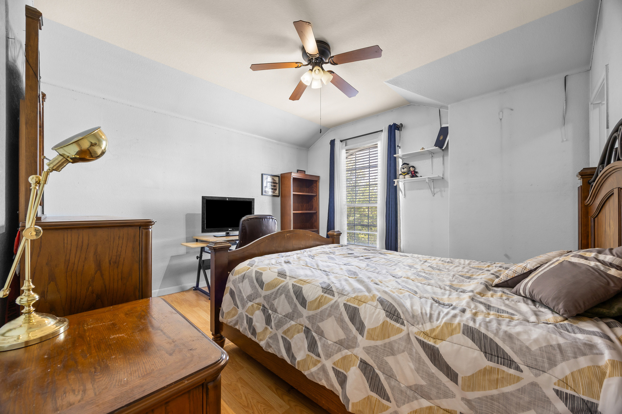 3502 Shiraz Loop Round Rock, TX 78665 - Photo 14 of 23 a bedroom with a bed and a table