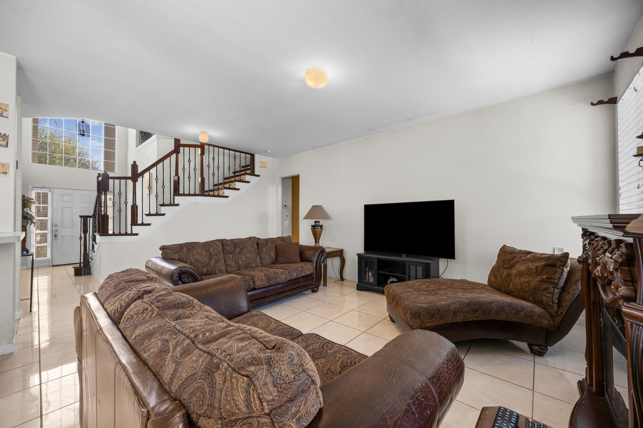 3502 Shiraz Loop Round Rock, TX 78665 - Photo 6 of 23 a living room with furniture and a flat screen tv