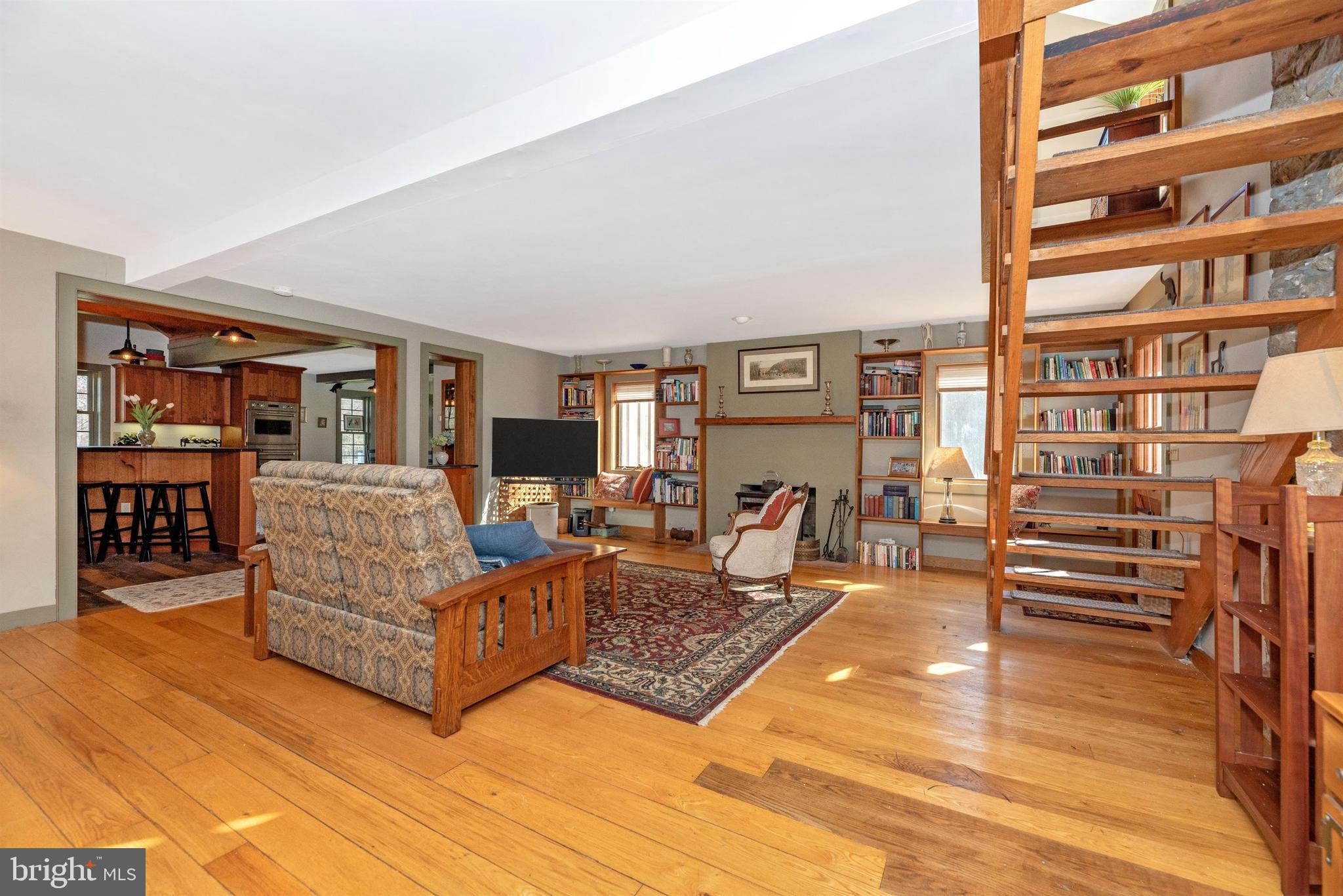 6112 Ford Road Frederick, MD 21702 - Photo 16 of 56 Hardwood flooring and woodstove.