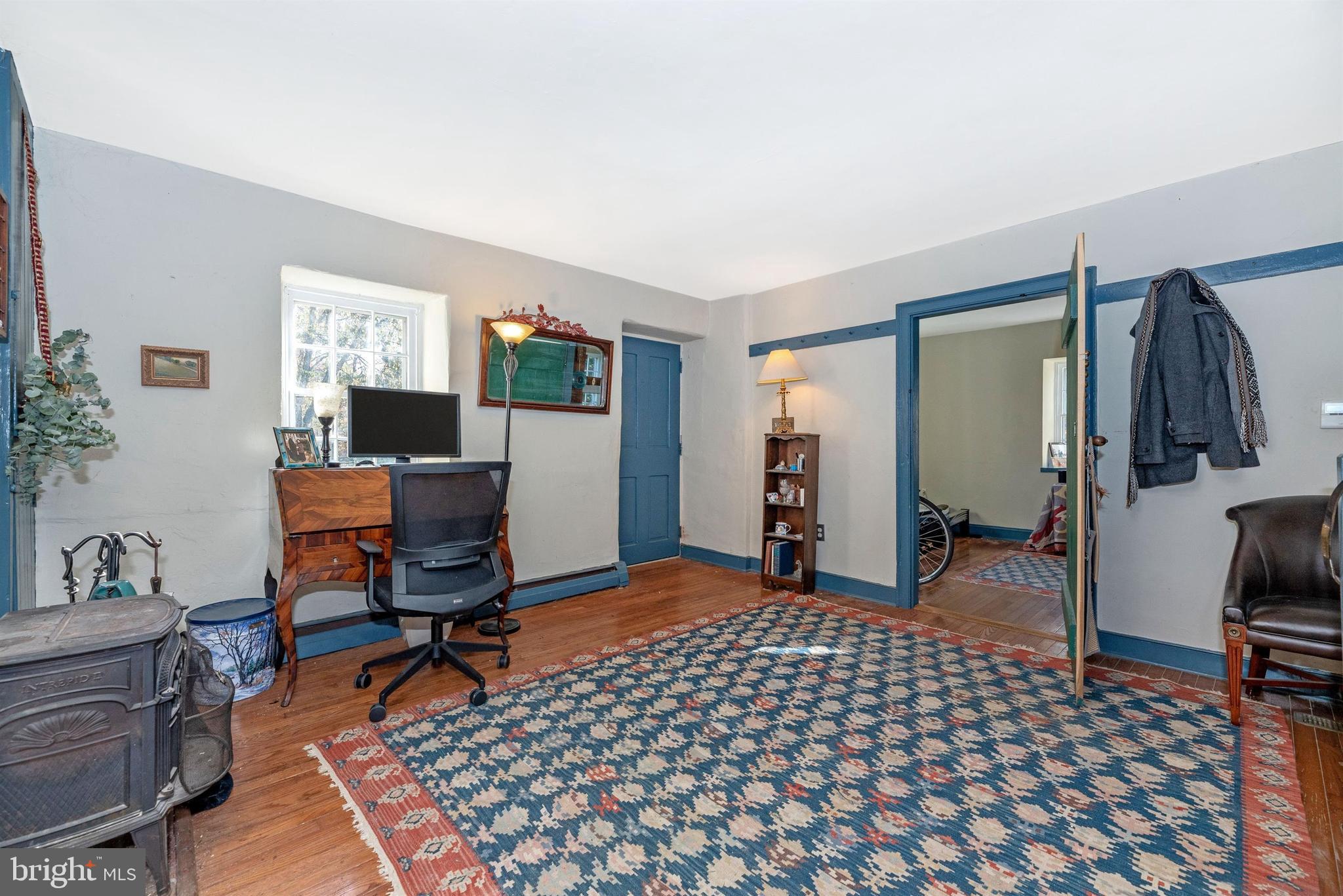 6112 Ford Road Frederick, MD 21702 - Photo 25 of 56 Main level office with woodstove.