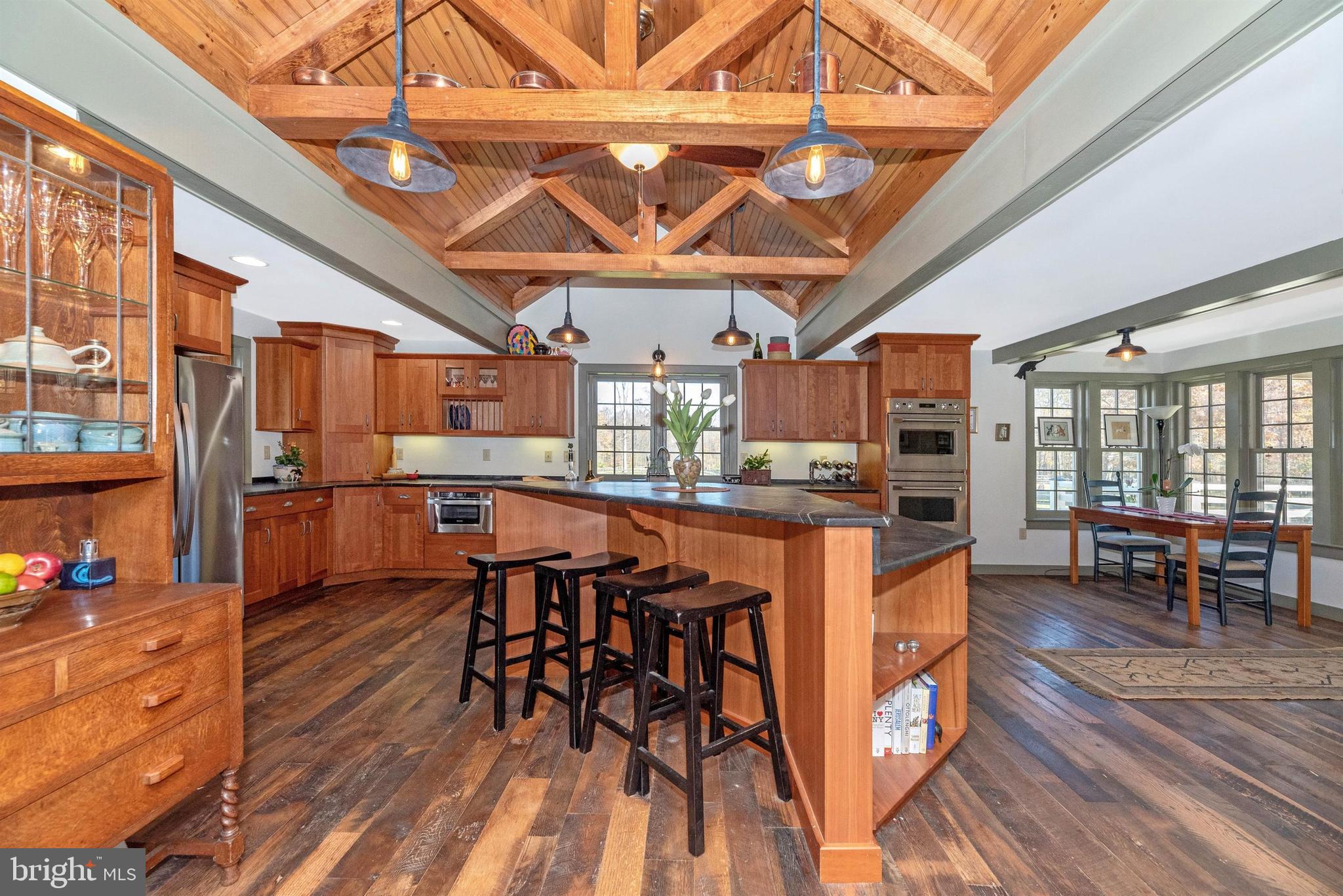6112 Ford Road Frederick, MD 21702 - Photo 8 of 56 Beautiful tiered island creates bar space.