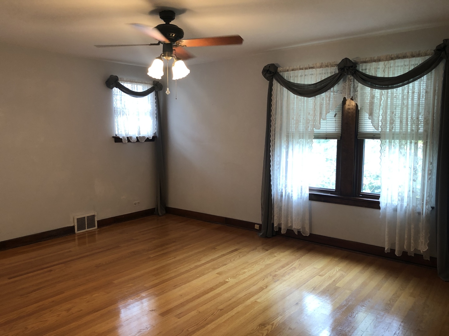 526 Longcommon Road Riverside, IL 60546 - Photo 11 of 40 wooden floor in an empty room with a window